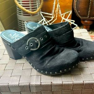 Dansko slouchy black suede clogs